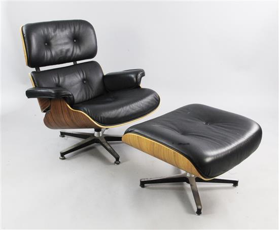 A black leather and rosewood veneered 670/671 lounge chair and matching ottoman, after a design by Charles Eames,